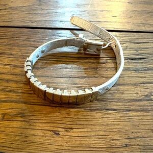 Michael Kors Bracelet silver leather strap w/silver hardware in used condition